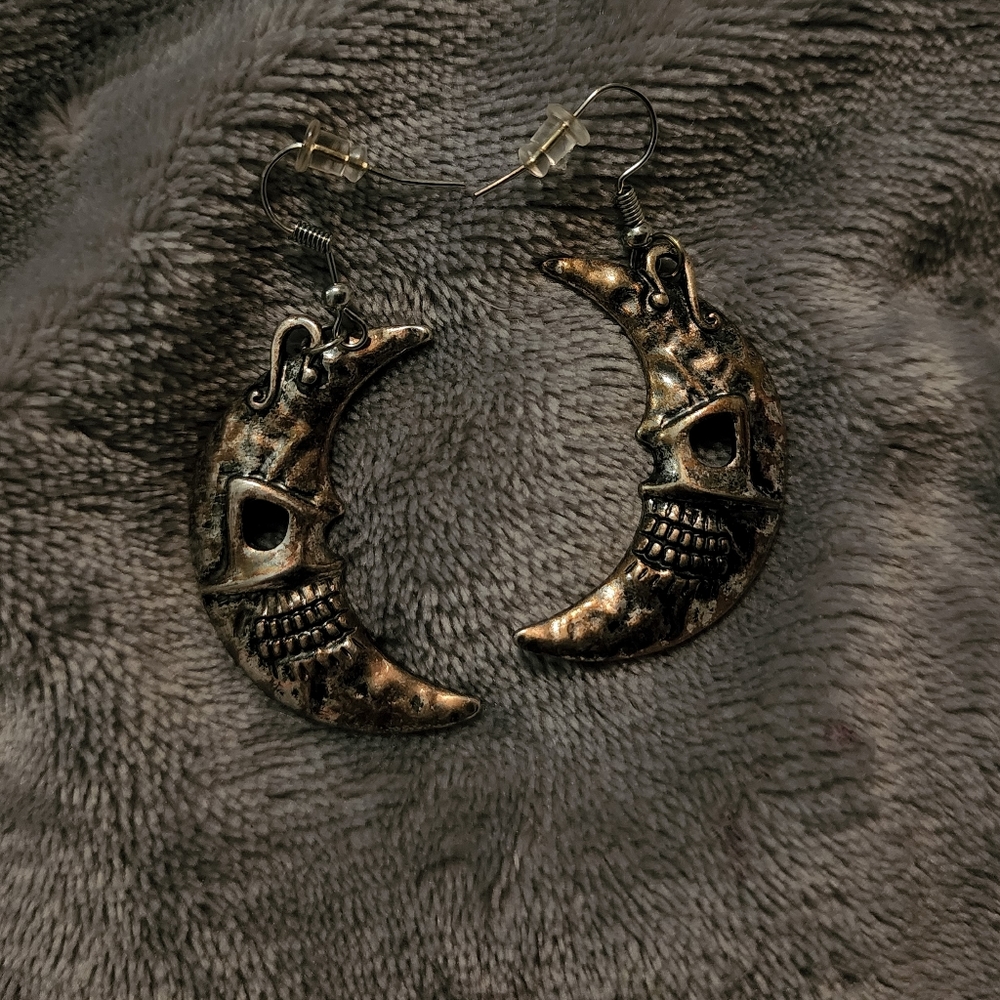 moon earrings.